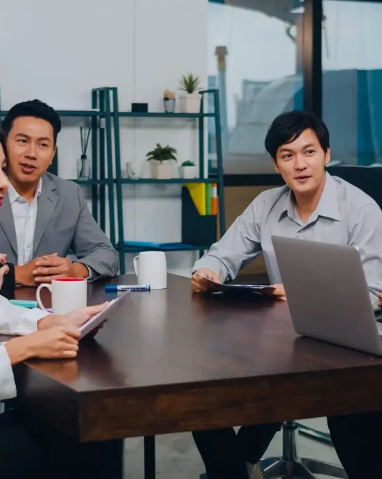 millennial-asia-businessmen-businesswomen-having-conference-video-call-meeting-brainstorming-ideas-about-new-project-colleagues-working-together-planning-strategy-enjoy-teamwork-modern-office